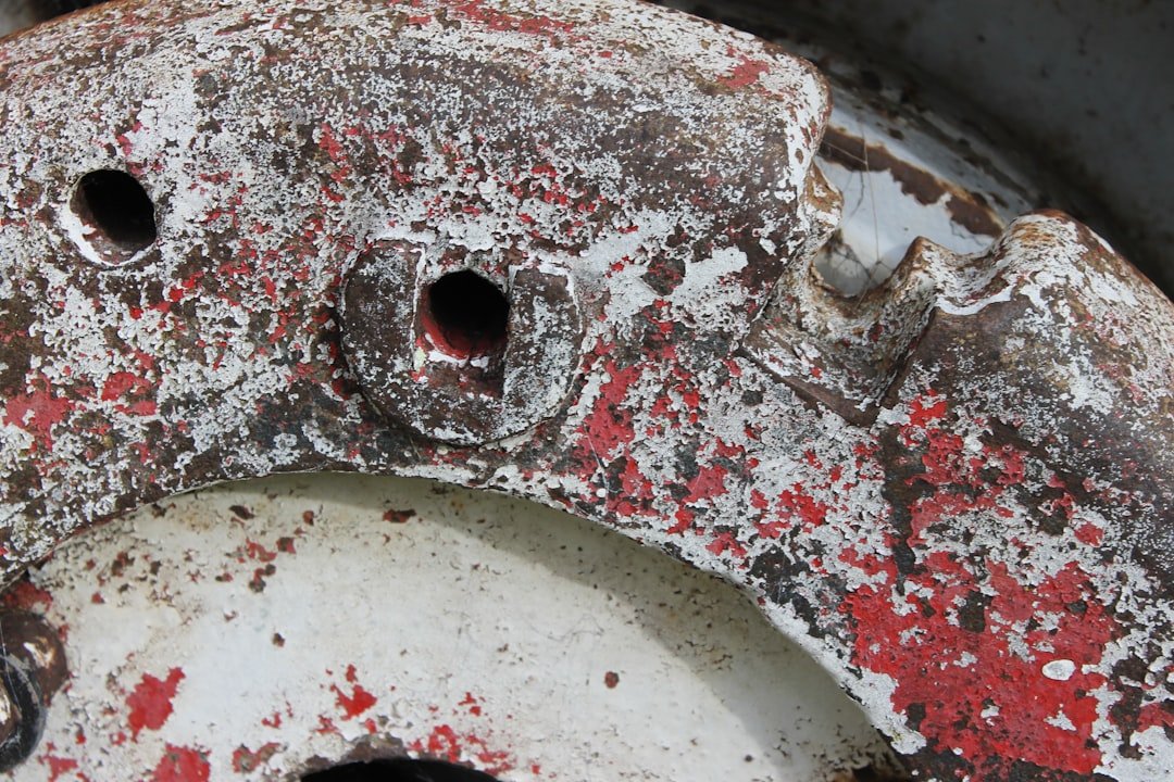 Worn brake pad compared to new brake pad