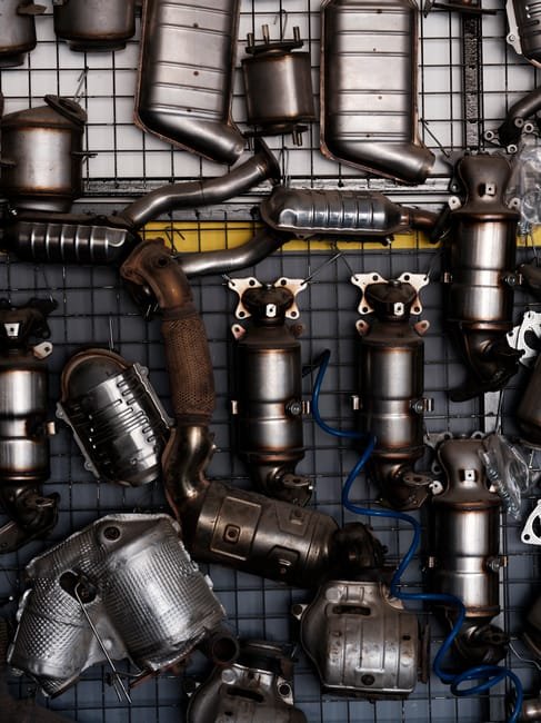 catalytic converter in car exhaust system showing heat damage