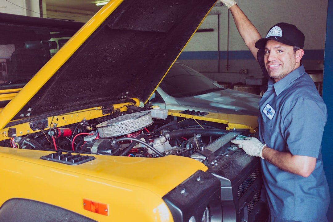 Mechanic explaining vehicle repair details to customer