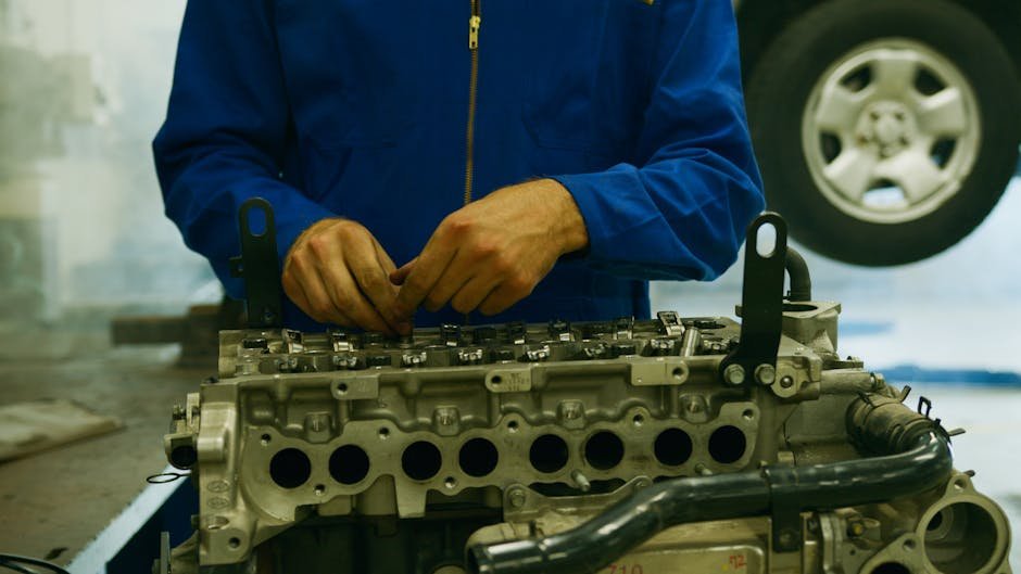 Engine repair inspection at auto shop