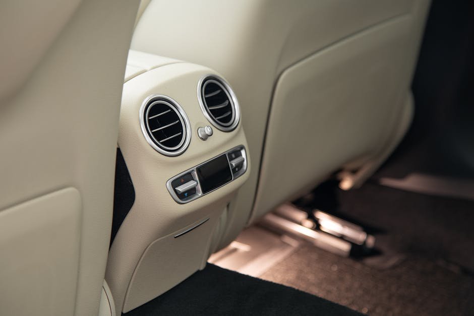 Air conditioning vents blowing air in car interior