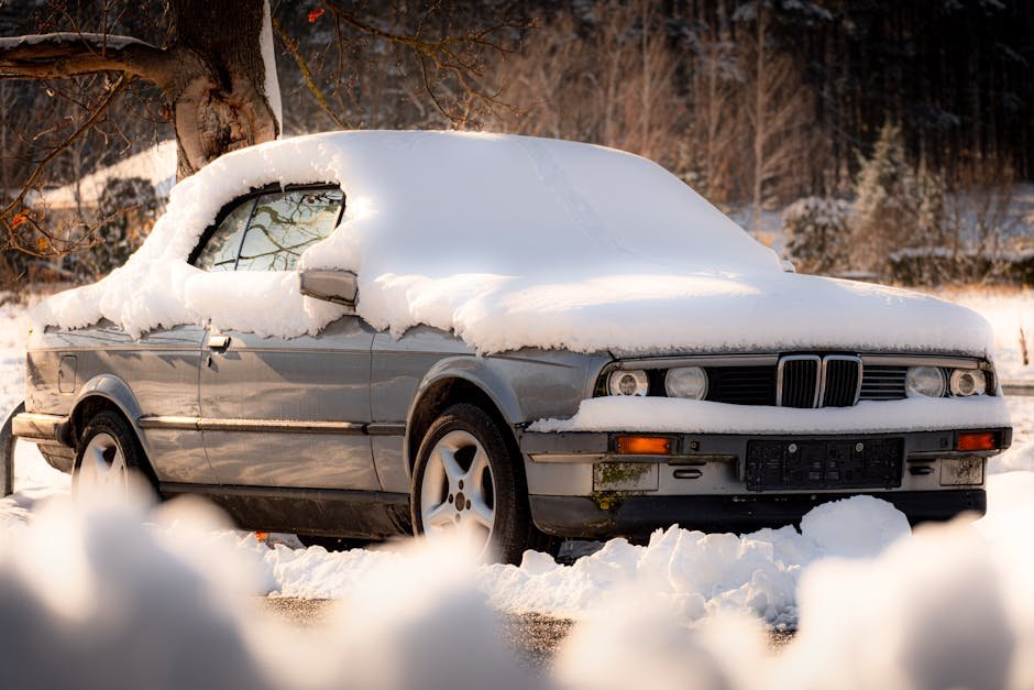 Car in winter snow and ice conditions