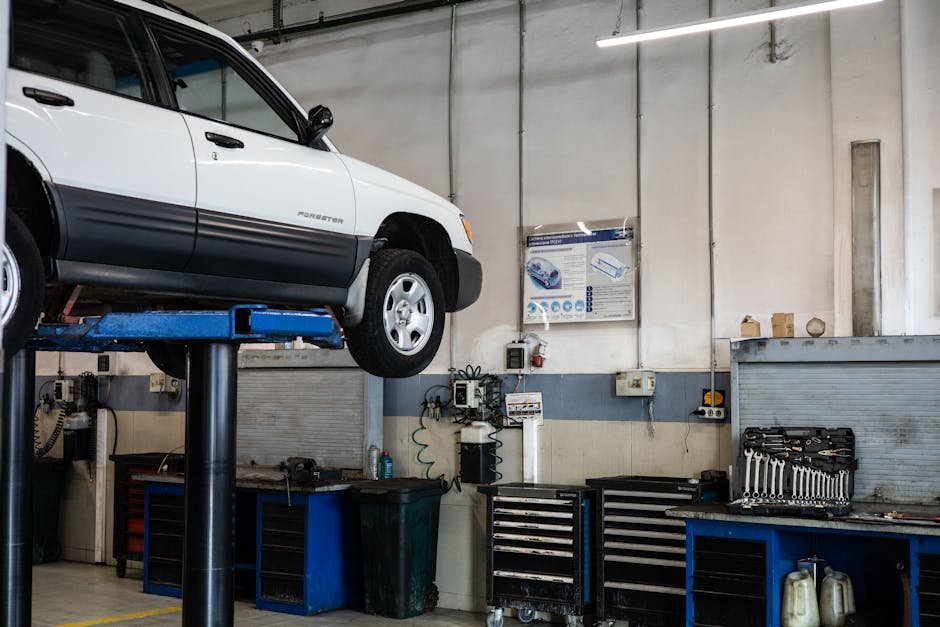 Mechanic performing thorough oil change service