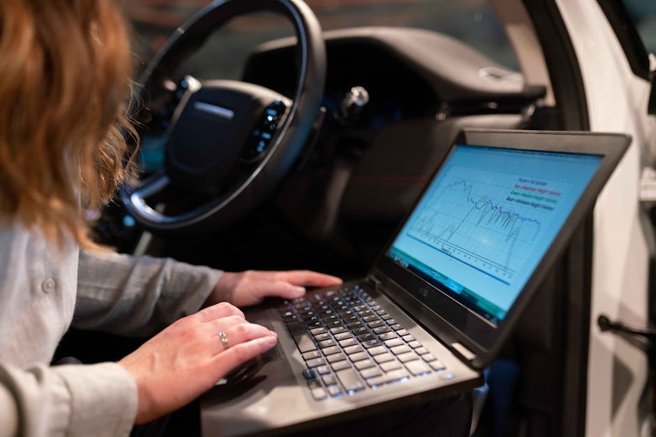 Car computer diagnostic test being performed