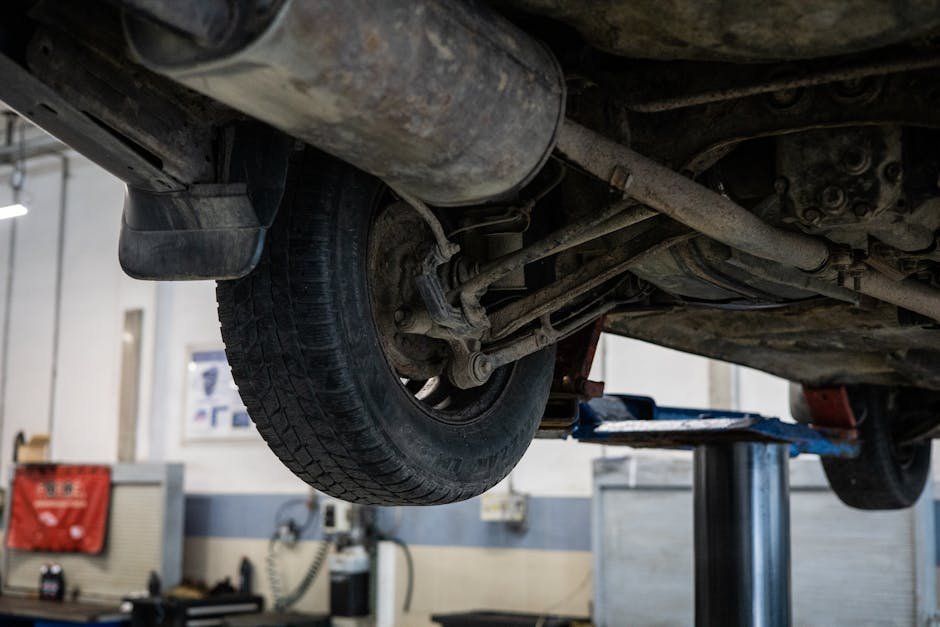 Wheel alignment service at auto repair shop