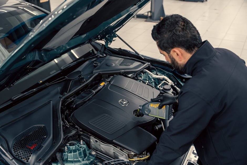 Sports car engine service and oil change