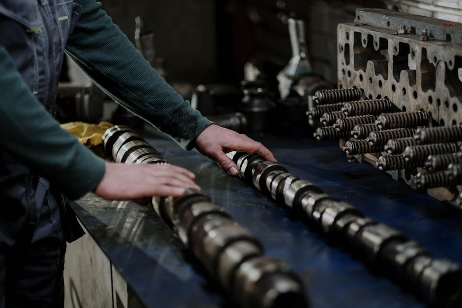Mechanic working on engine cylinder repair