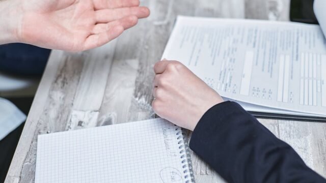 car warranty document and coverage terms being reviewed
