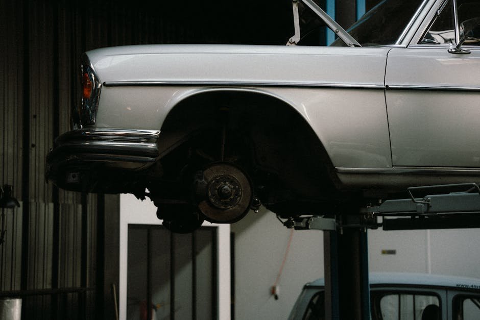 auto body shop assessing vehicle damage after accident